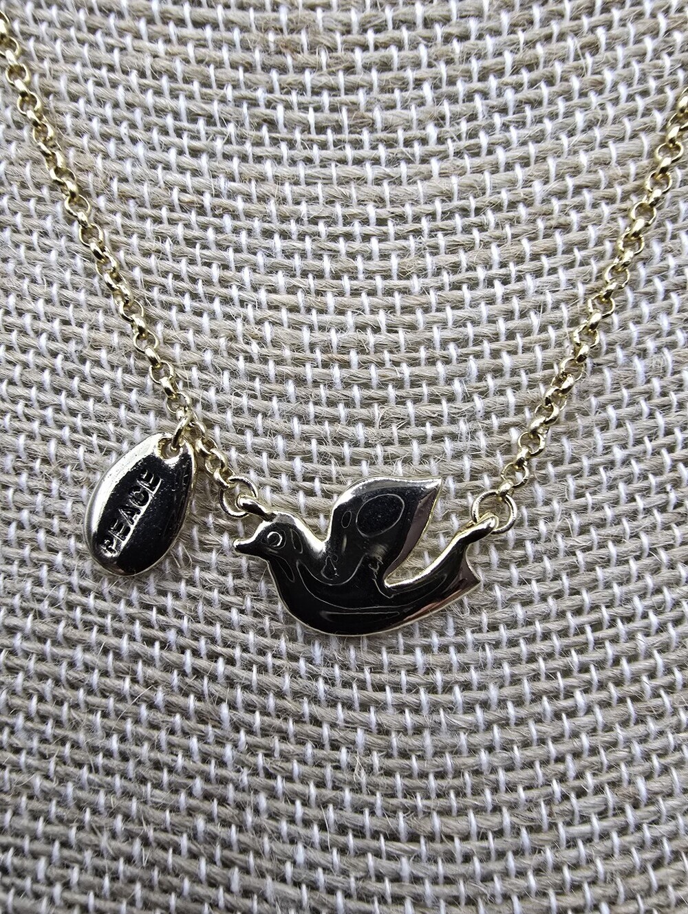 Cookie Lee Gold Tone Dove Pendant Necklace With Peace Tag